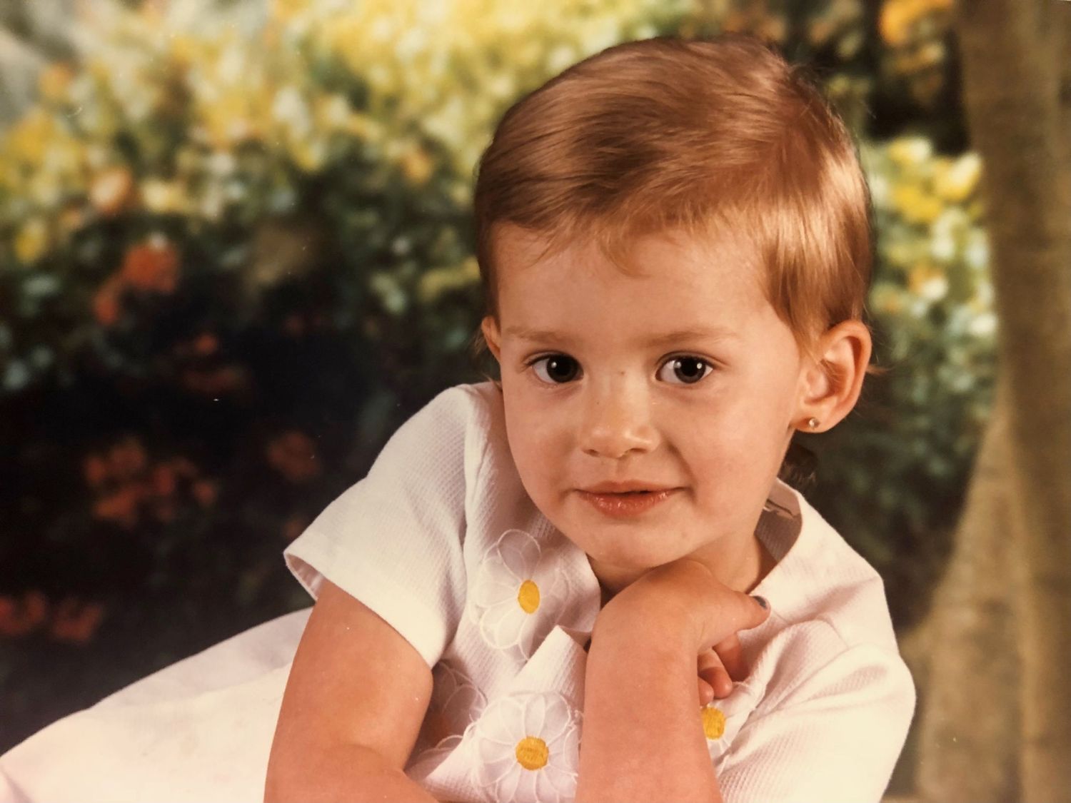 A sequence of portrait photographs showing a child with auburn hair in front of blurred outdoor backgrounds, smiling.