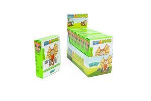 Retail display box of green-packaged pet treats shown at multiple angles with sun logo design.