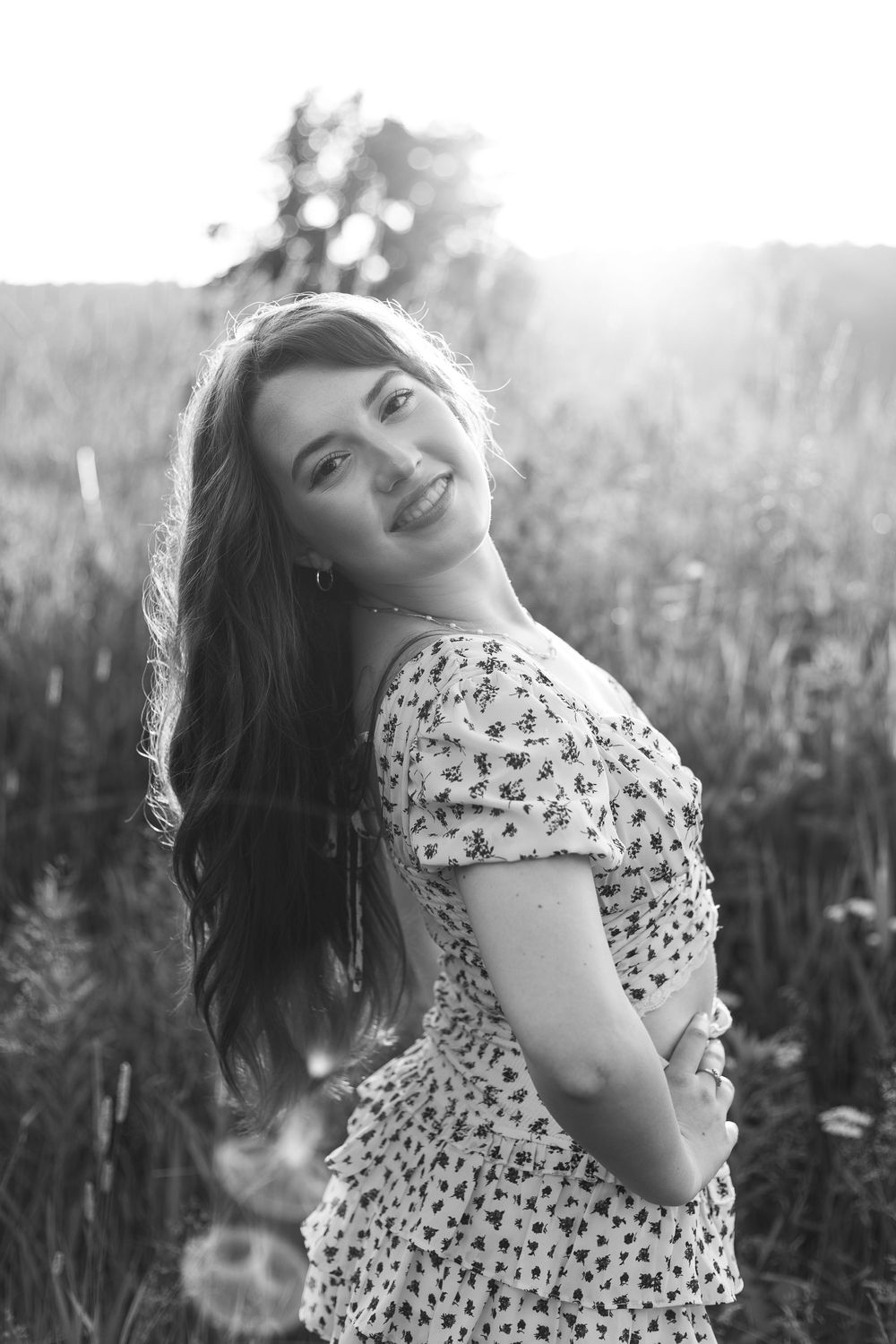 black and white portrait in a field by Judith Olson Photography
