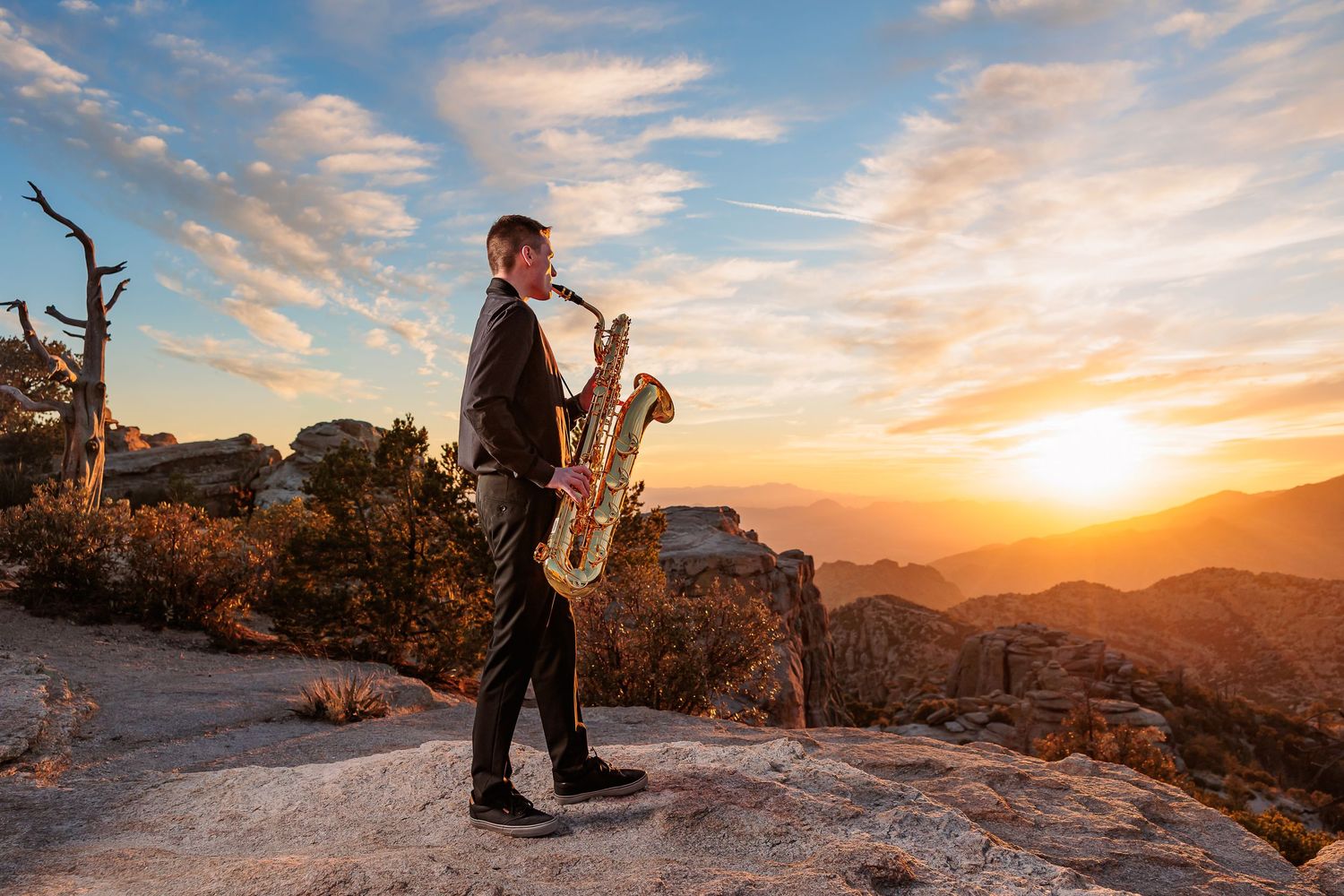 Tucson senior photos on Mt. Lemmon with sunset and cascading mountain views with an instument