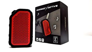 Multiple red Wismi Active portable speakers shown with retail packaging.