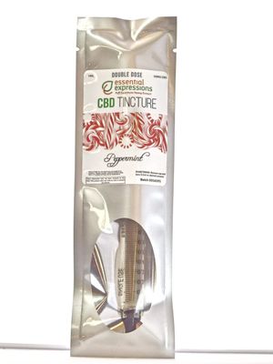 White product packaging pouches with CBD tincture branding and clear window displays.
