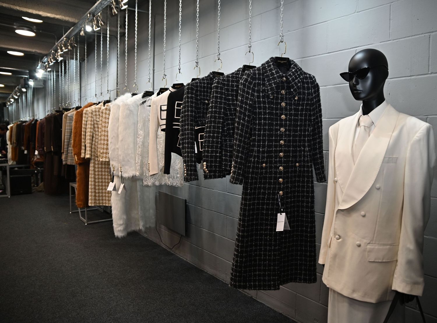 Clothes on a rail, showcases the designers outfits during London Fashion Week.