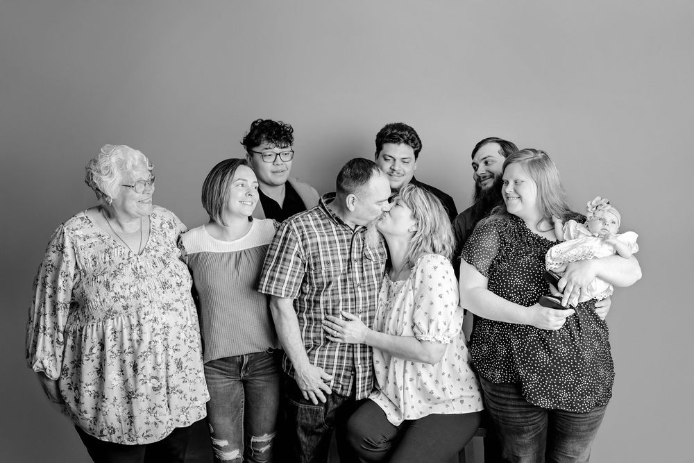 Candid moment of a family happy together during a relaxed generational portrait session, Fairbanks Alaska portrait photographer