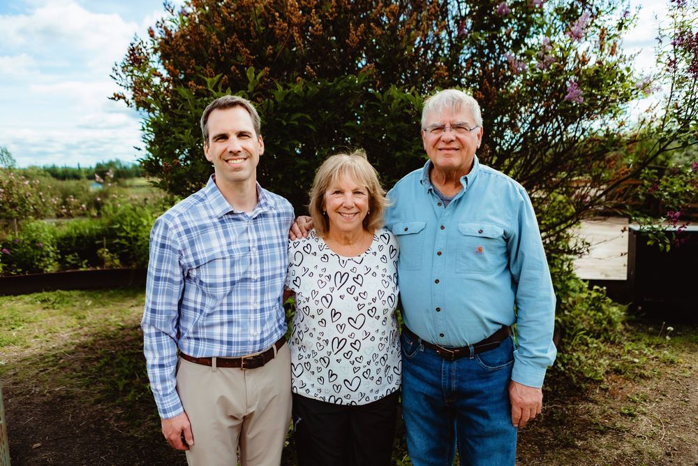 Candid moment of a family happy together during a relaxed generational portrait session, Fairbanks Alaska portrait photographer