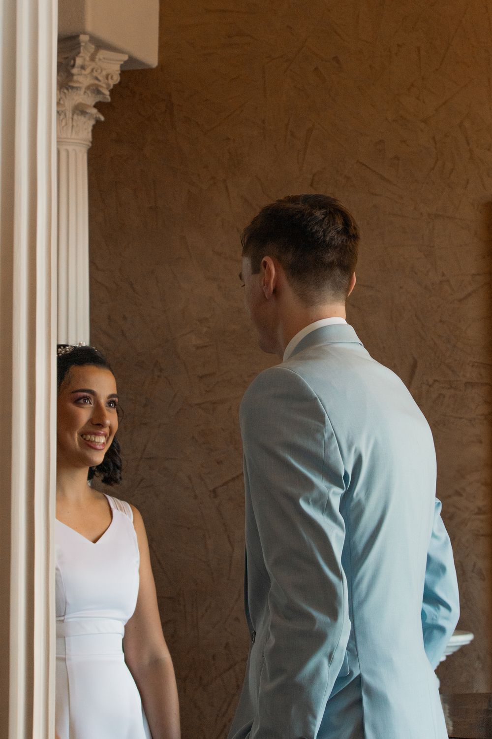 Candid moment of bride and groom first look before the ceremony at their Eastern Washington wedding
