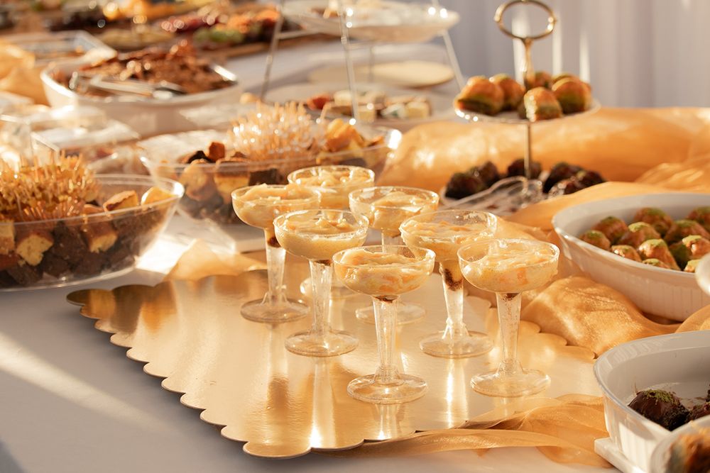 Wedding catering table with mini appetizers, pastries, and drinks at Eastern Washington wedding