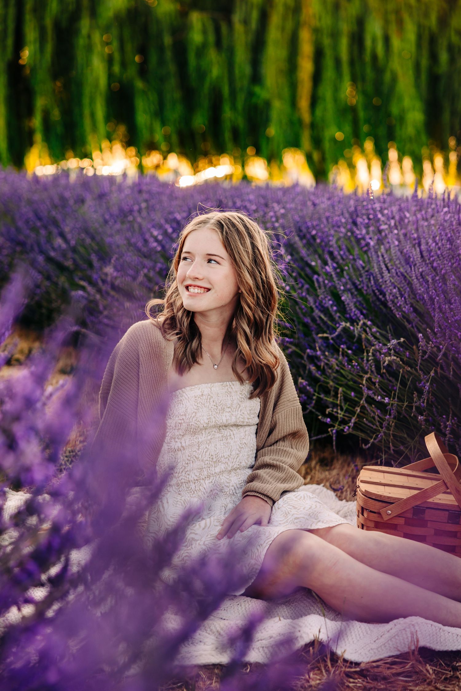 A series of dreamy portraits taken in a blooming lavender field at golden hour.