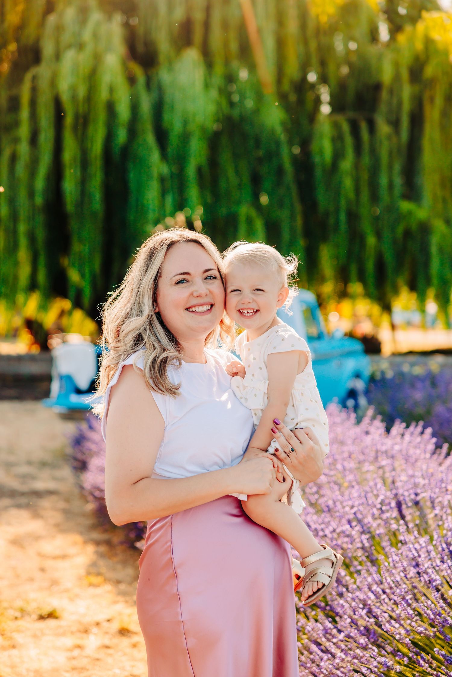A tender embrace shared among loved ones in a beautiful lavender field during golden hour.