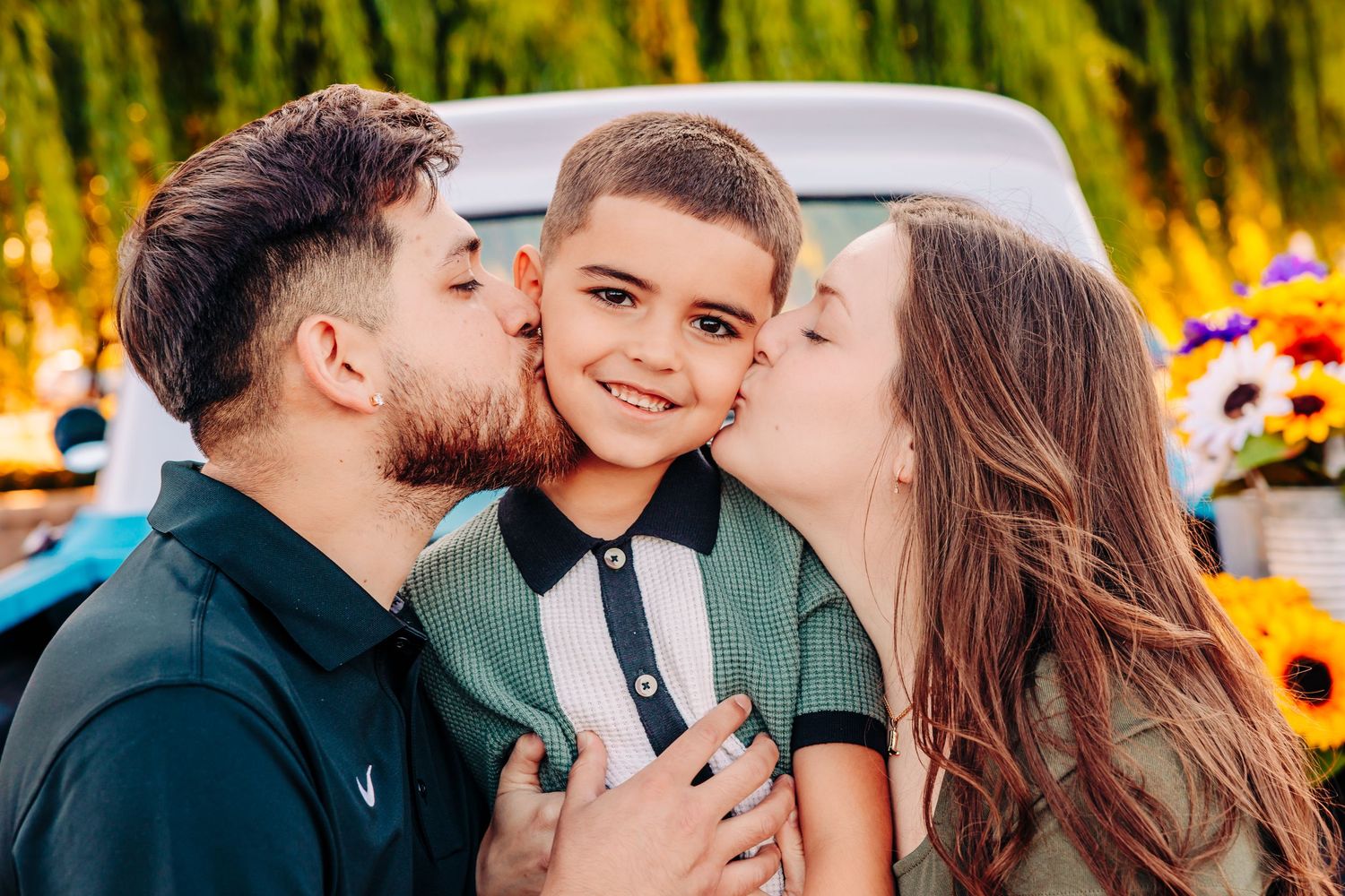 Affectionate family moment captured in a series of four photos with warm sunset lighting and sunflowers in the background.