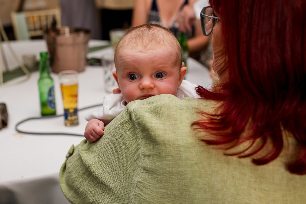 Candid moments captured during a celebration event.