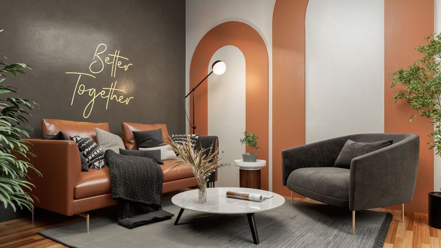 Modern living room with terracotta and white arched wall design, leather sofa, accent chair and round coffee table.