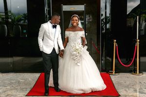 Couple walking out holding hands
