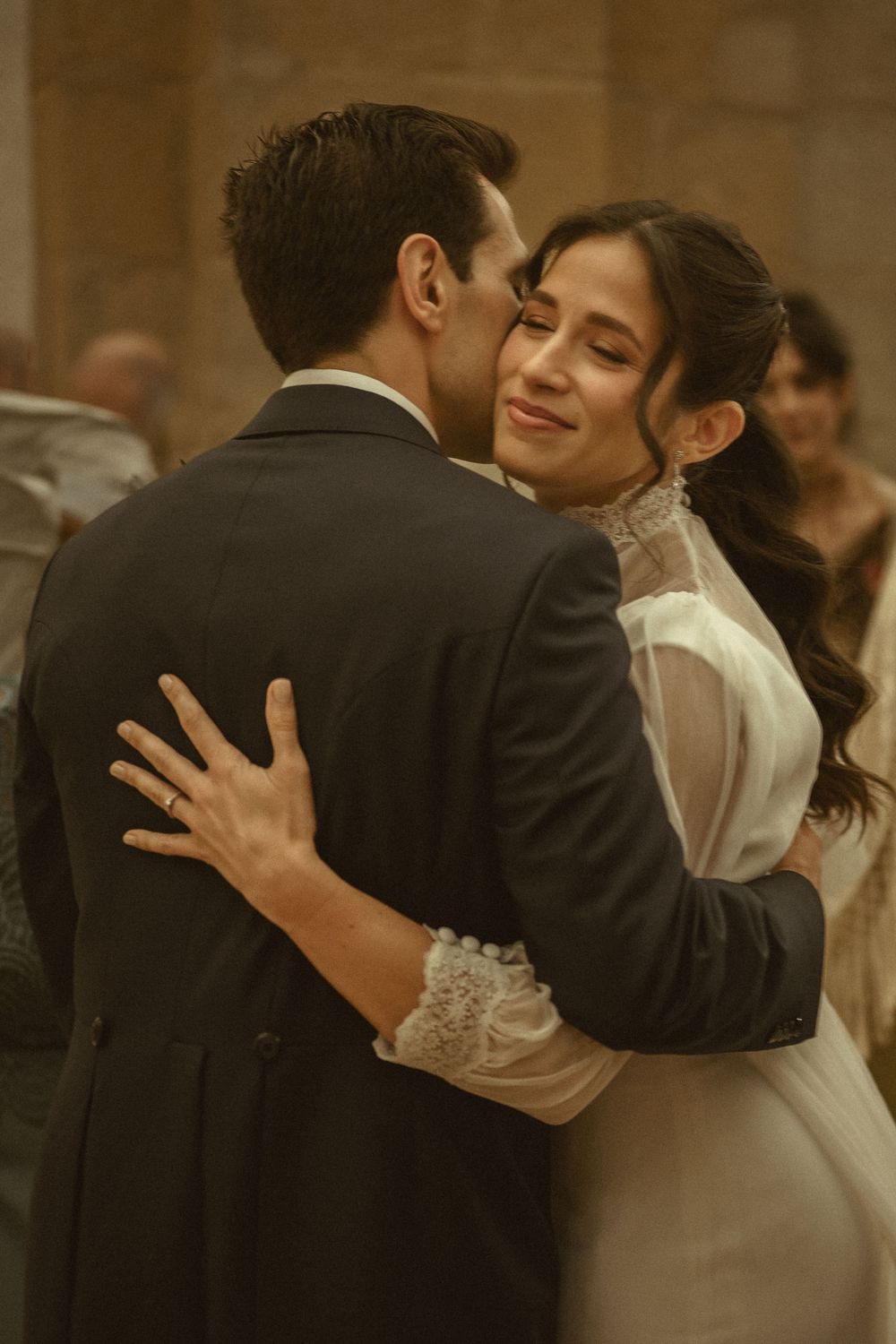 A sequence of romantic dance photos showing couples in formal attire embracing on a dimly lit dance floor.