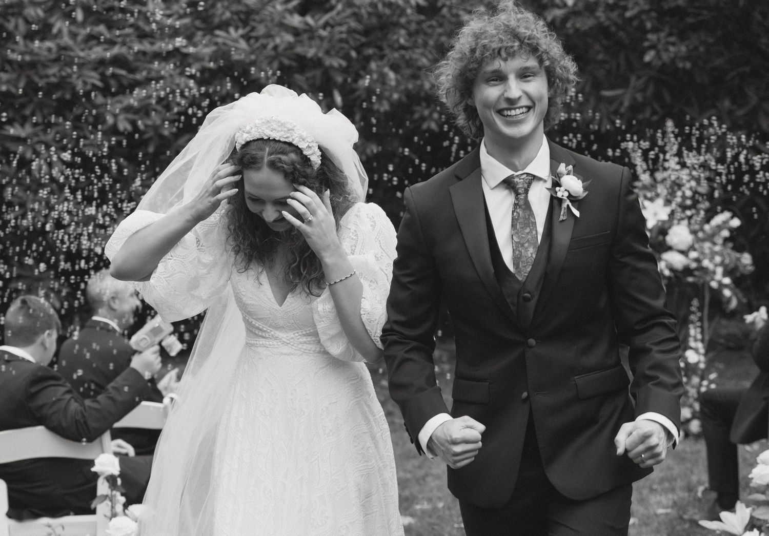 Wedding celebration candid moments captured in black and white photography.