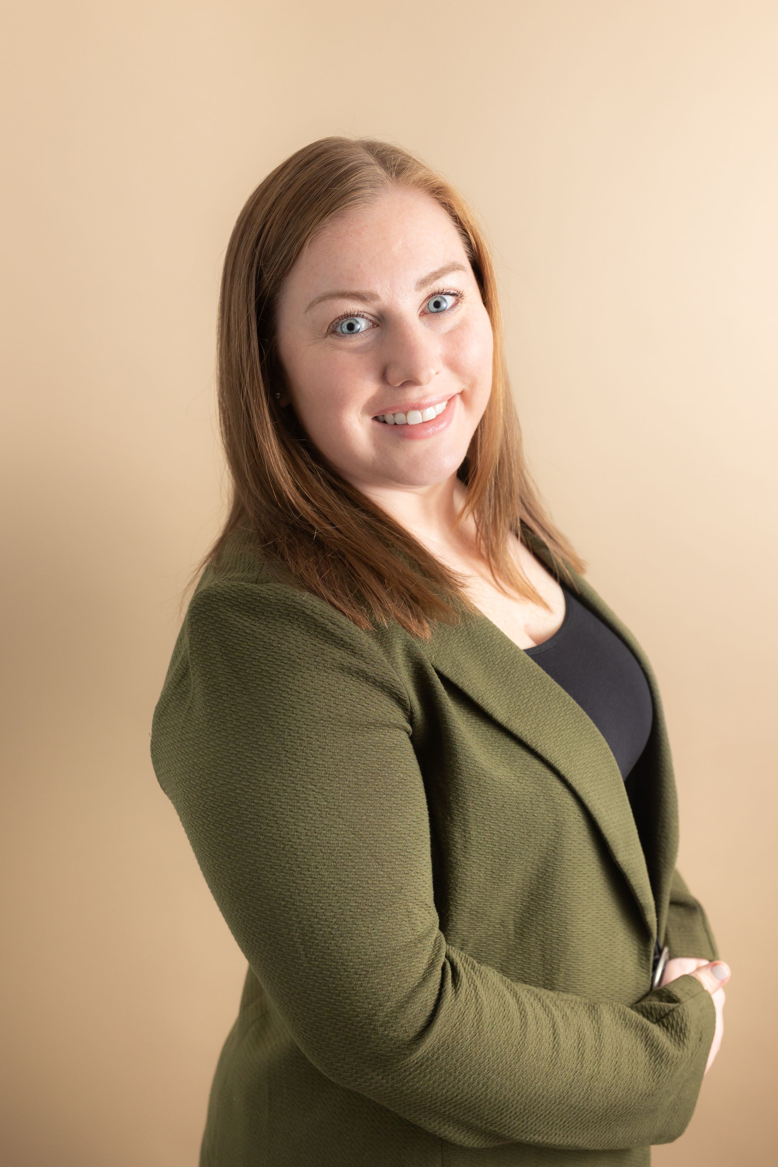 Professional headshot of a small business owner taken at Samantha Ann Photo studio in Swansboro, North Carolina