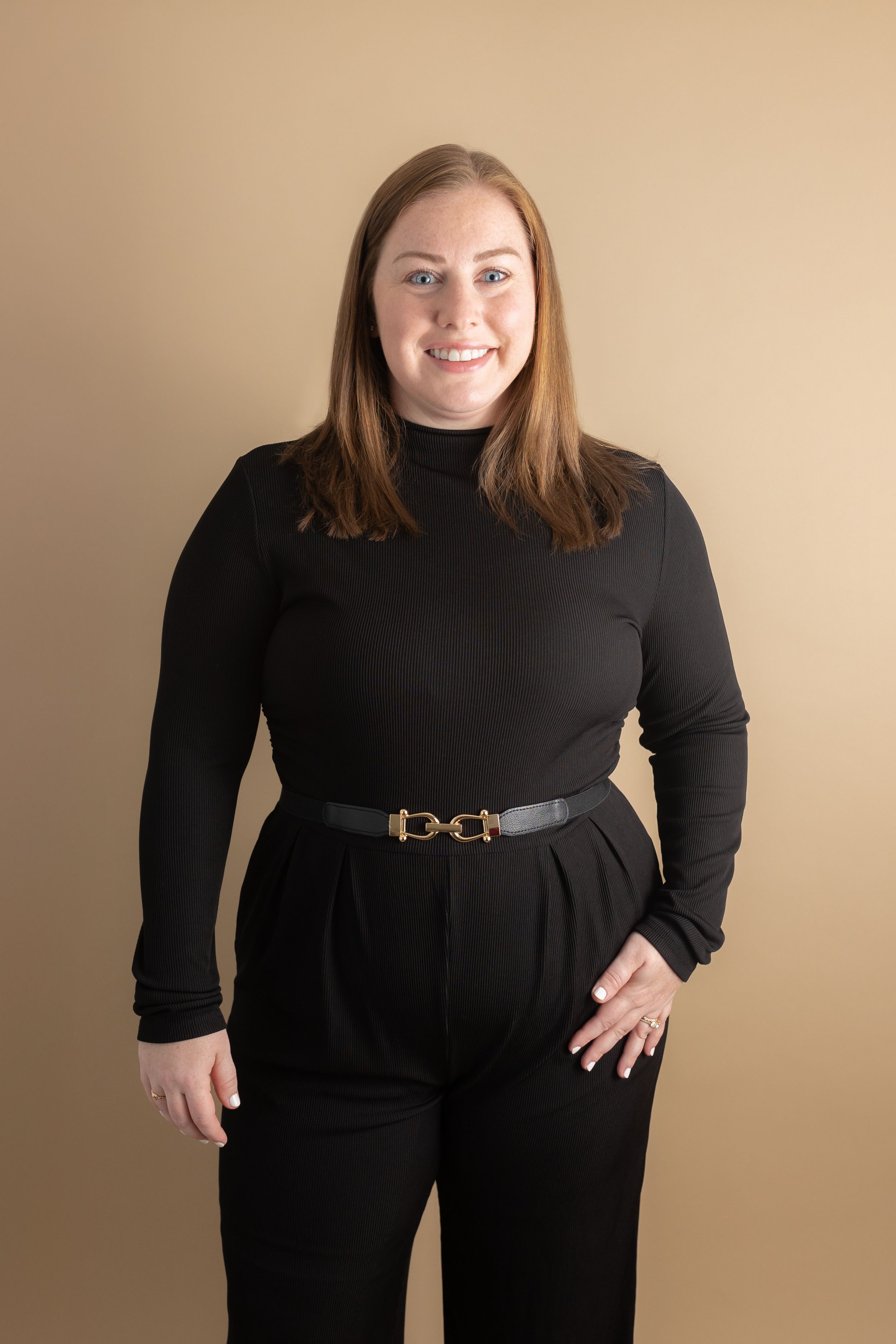 Business portrait of a local entrepreneur from Hubert NC captured in a clean, modern studio setting