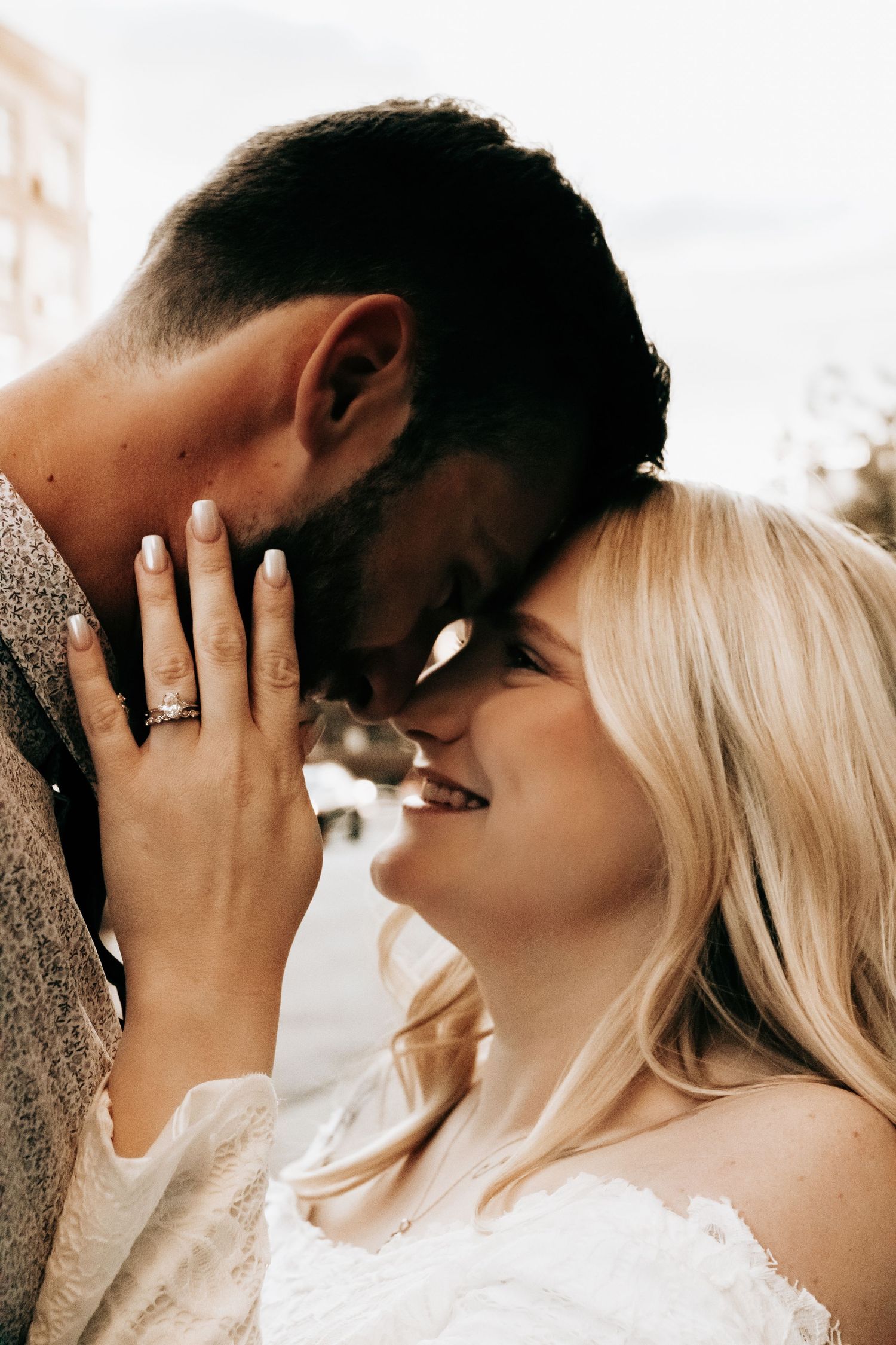 A romantic couple sharing intimate moments in a series of close-up shots showing affection and tenderness.
