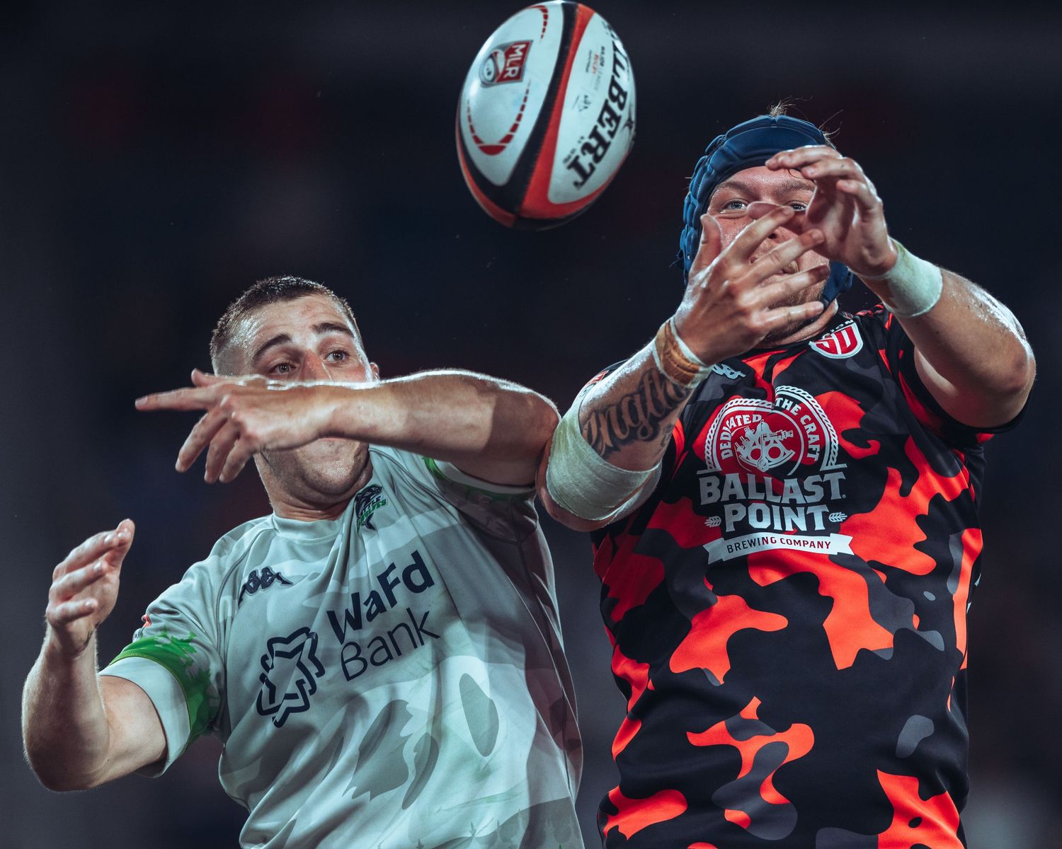 Rugby Player buckles his helmet pre-match. Major League Rugby. Sports Photography