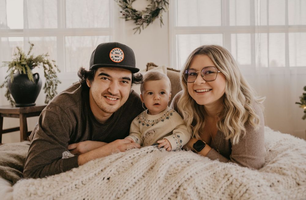 A cozy family photo collage showing intimate moments at home with warm neutral tones and holiday decor.