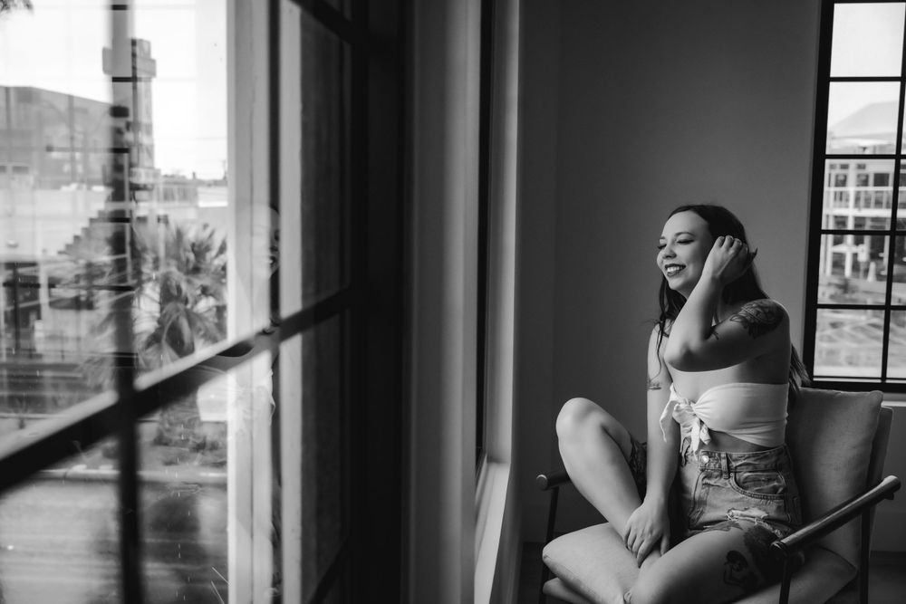 Celebrate natural beauty with bohemian boudoir; denim, wildflowers, and romantic charm for a self-love journey.