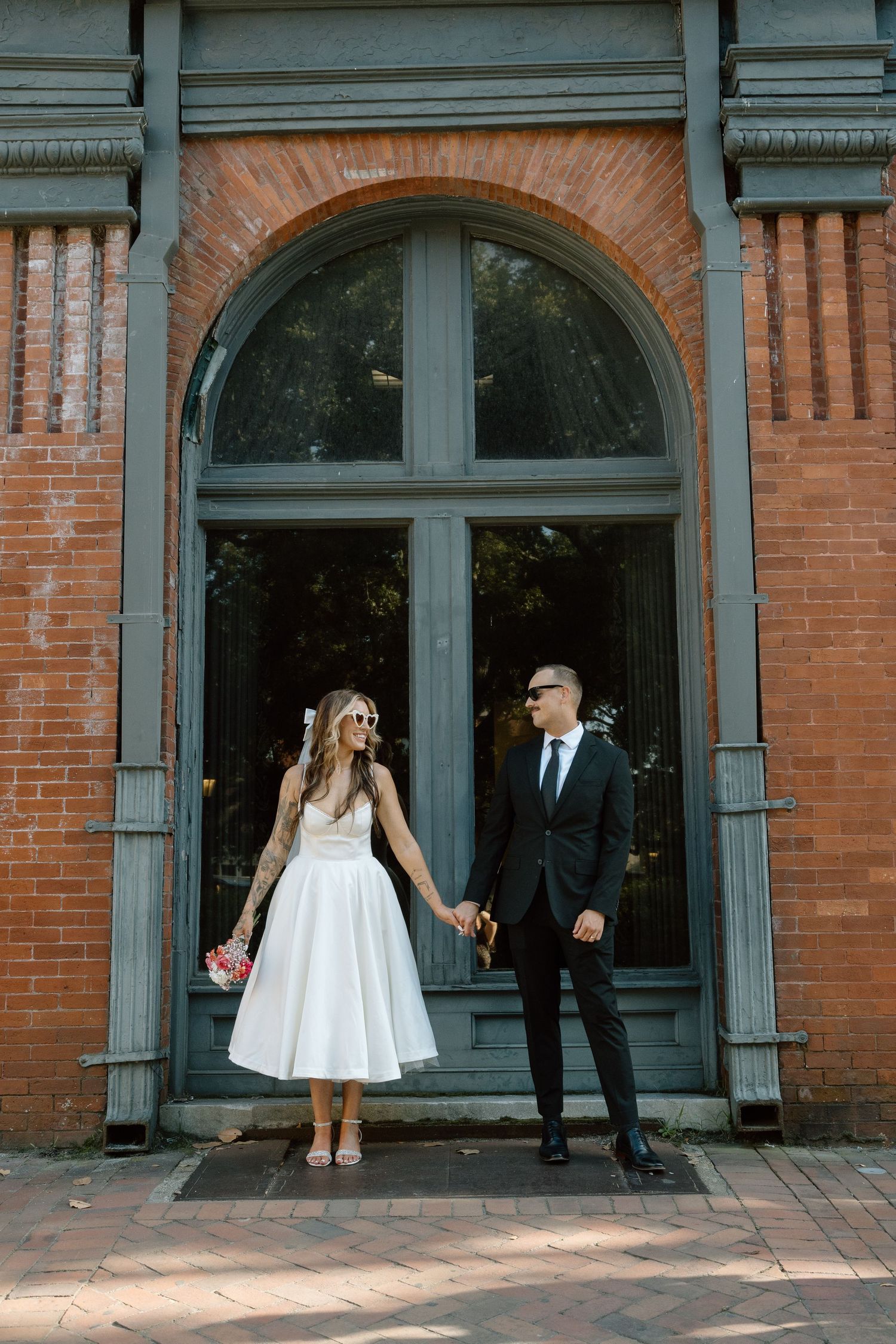 downtown elopement couple married asheville nc tattooed bride