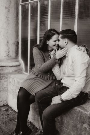 Series of intimate black and white photos showing tender romantic moments between a couple.