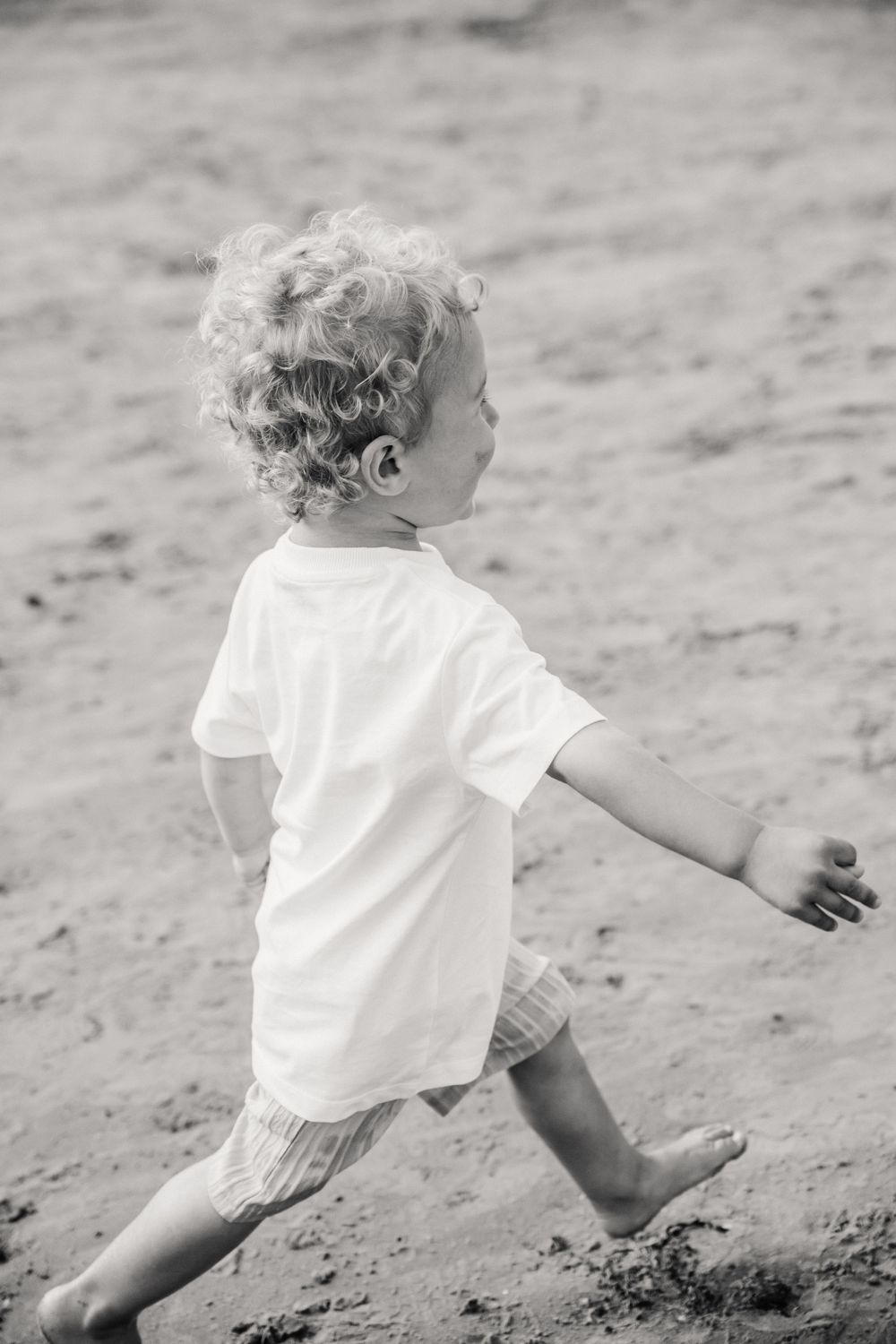 Family candid beach photoshoot Weymouth, Dorset. Dorset Family photographer. Weymouth Photographer. Candid Photography