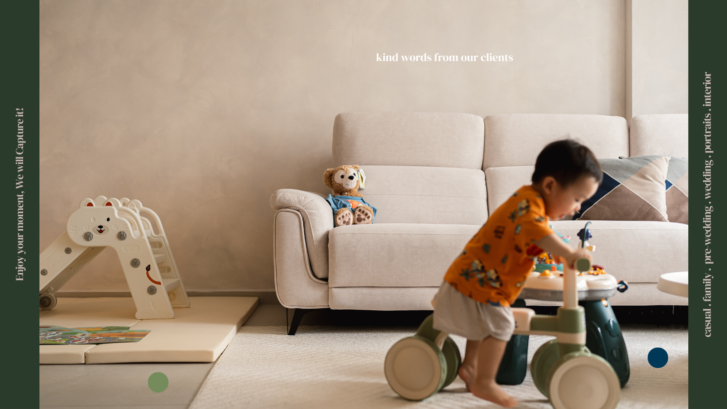 Toddler riding balance bike toy next to white sofa in living room.