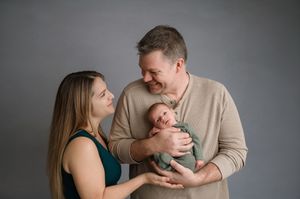 A touching series of tender family moments unfolds across six connected photos showing intimate newborn photography.