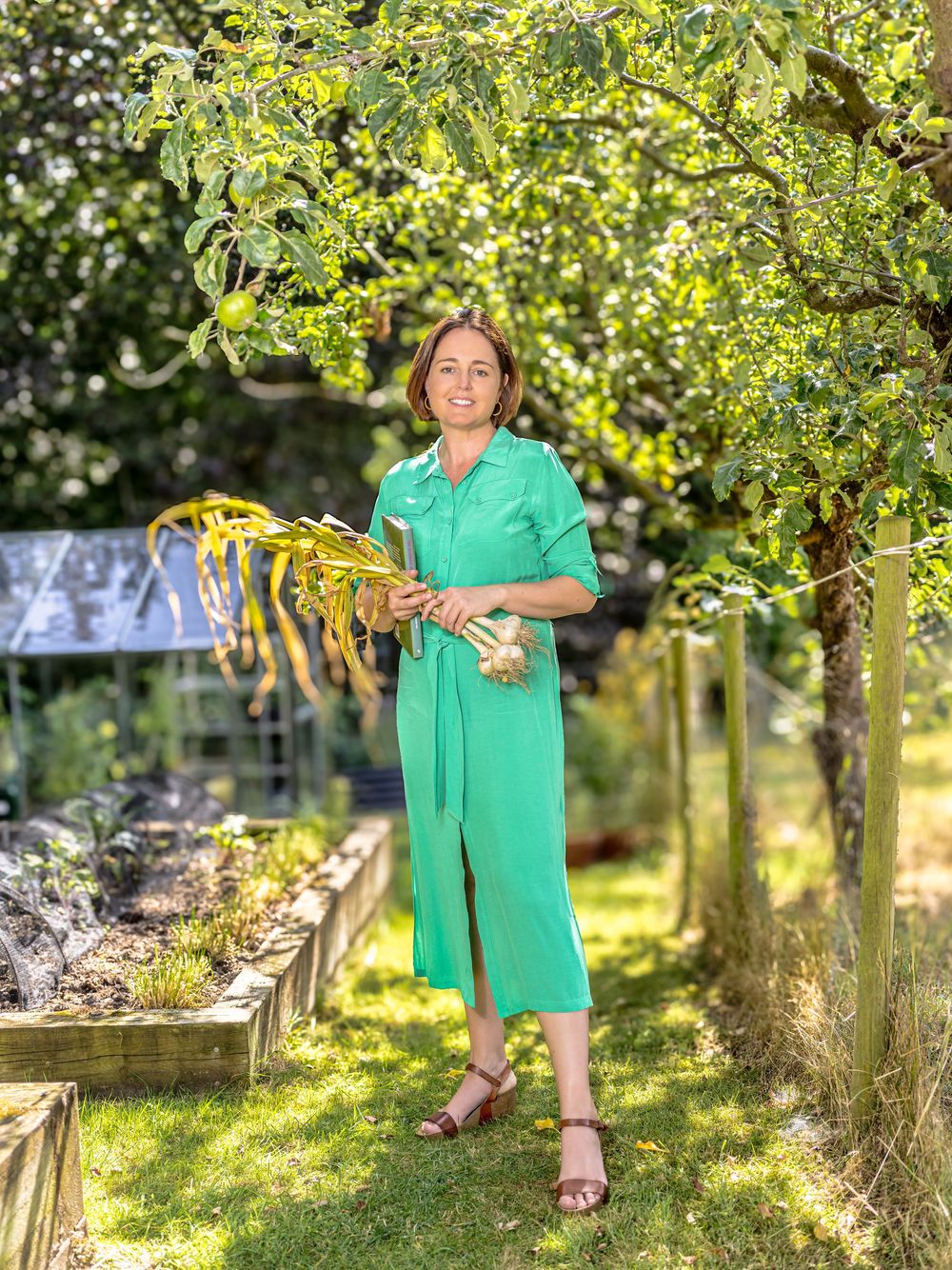 Personal branding portrait of Kate Cotterill in her garden, Harkstead, Suffolk