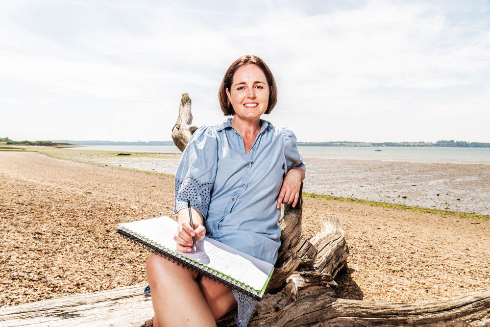 An editorial portrait of plant seed business owner Kate Cotterill on the Holbrook coastline, Suffolk.