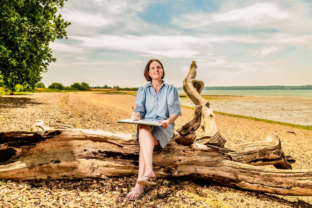Personal branding portrait of plant seed business owner Kate Cotterill on the Holbrook coastline, Suffolk.