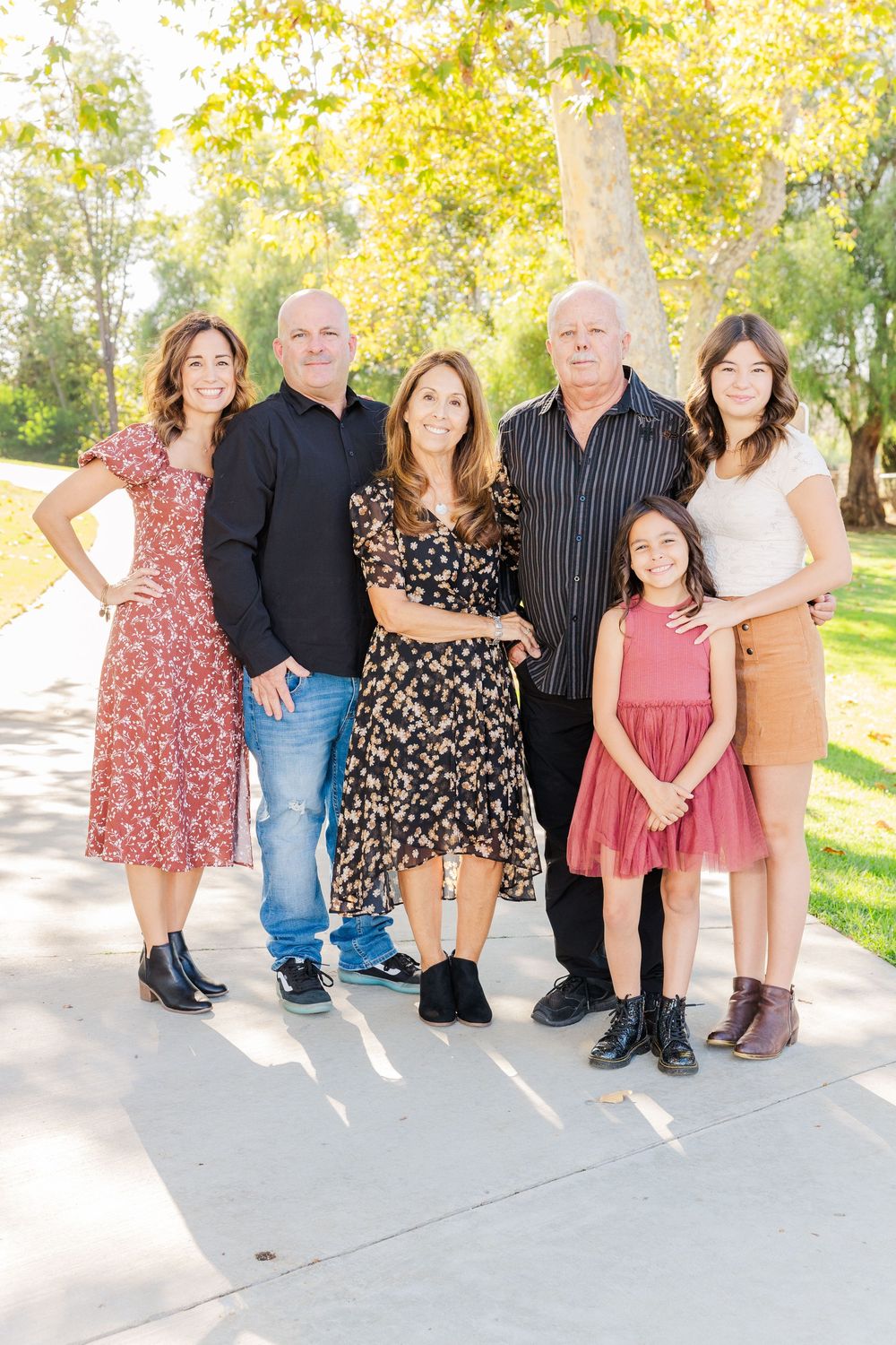 Simi Valley family photography capturing joyful moments with parents, kids, and extended family in beautiful outdoor settings.