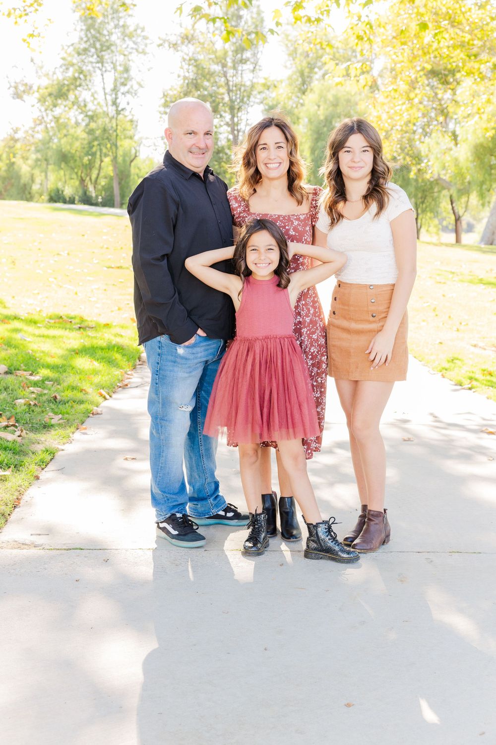 Simi Valley family photography capturing joyful moments with parents, kids, and extended family in beautiful outdoor settings.