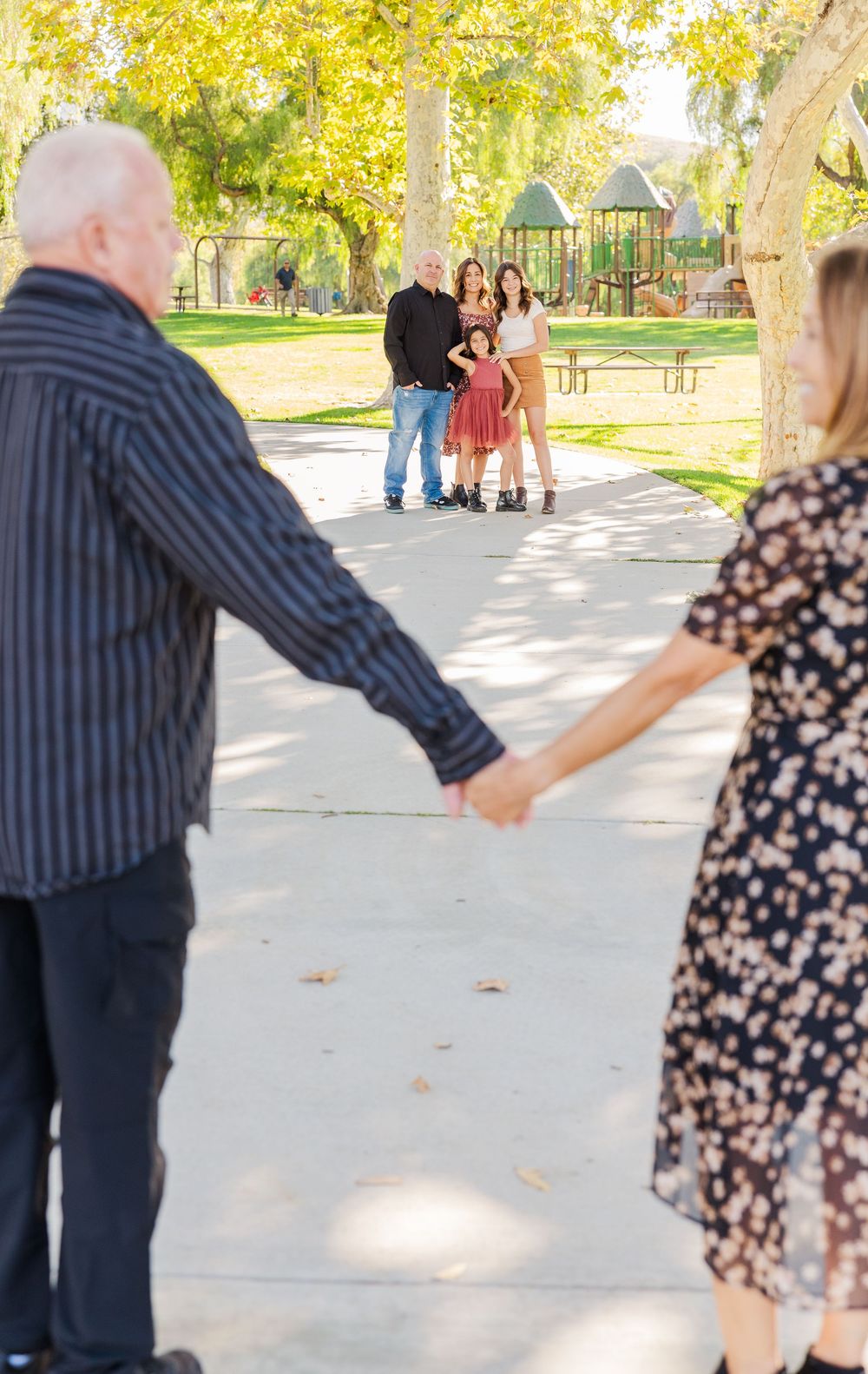 Simi Valley family photography capturing joyful moments with parents, kids, and extended family in beautiful outdoor settings.