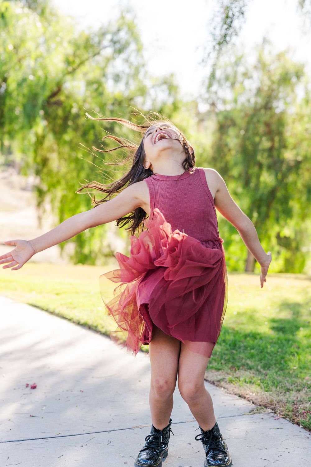Simi Valley family photography capturing joyful moments with parents, kids, and extended family in beautiful outdoor settings.