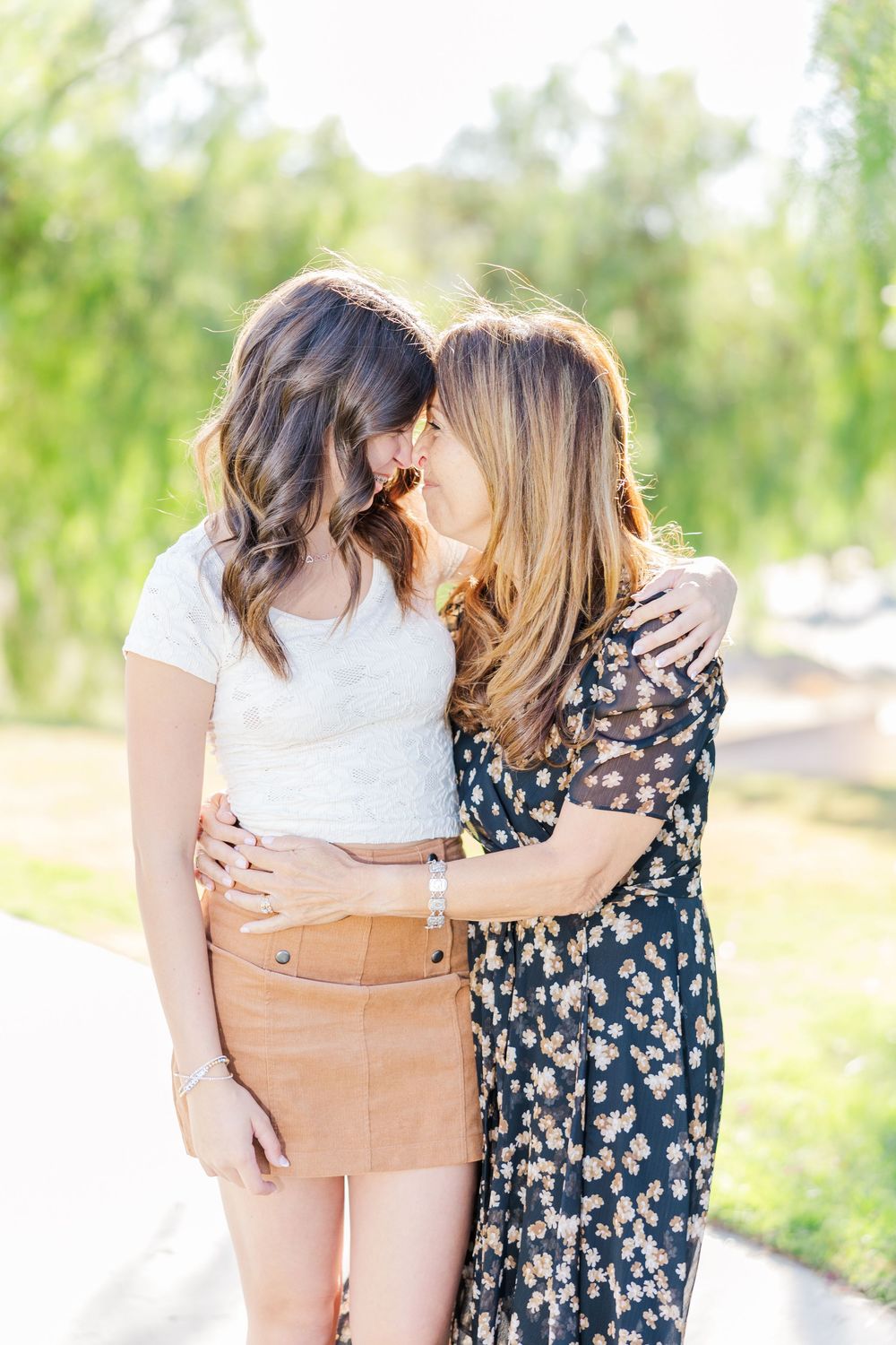 Simi Valley family photography capturing joyful moments with parents, kids, and extended family in beautiful outdoor settings.