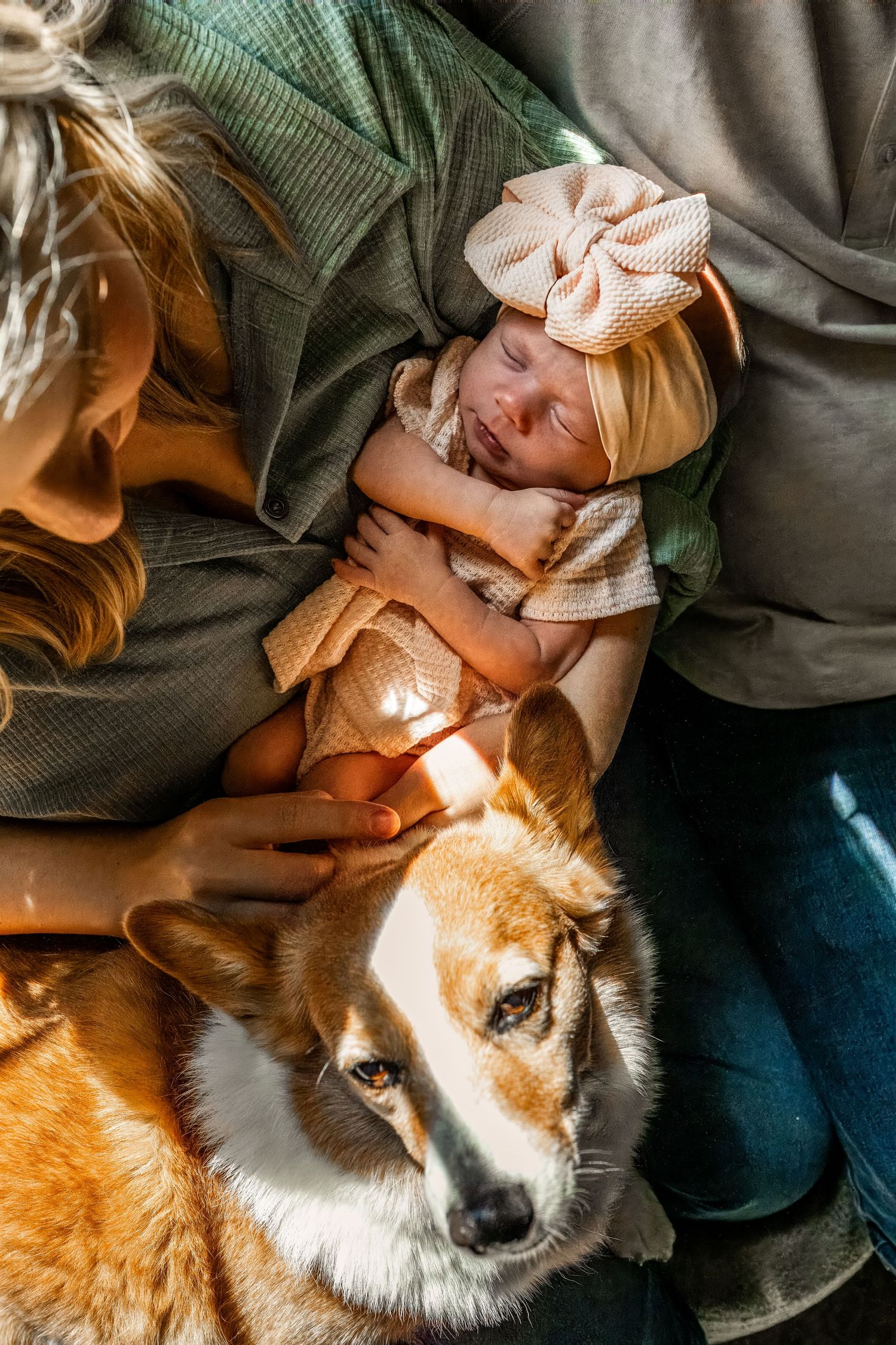 Mom with baby and pet during at-home newborn session in Marrero, Louisiana