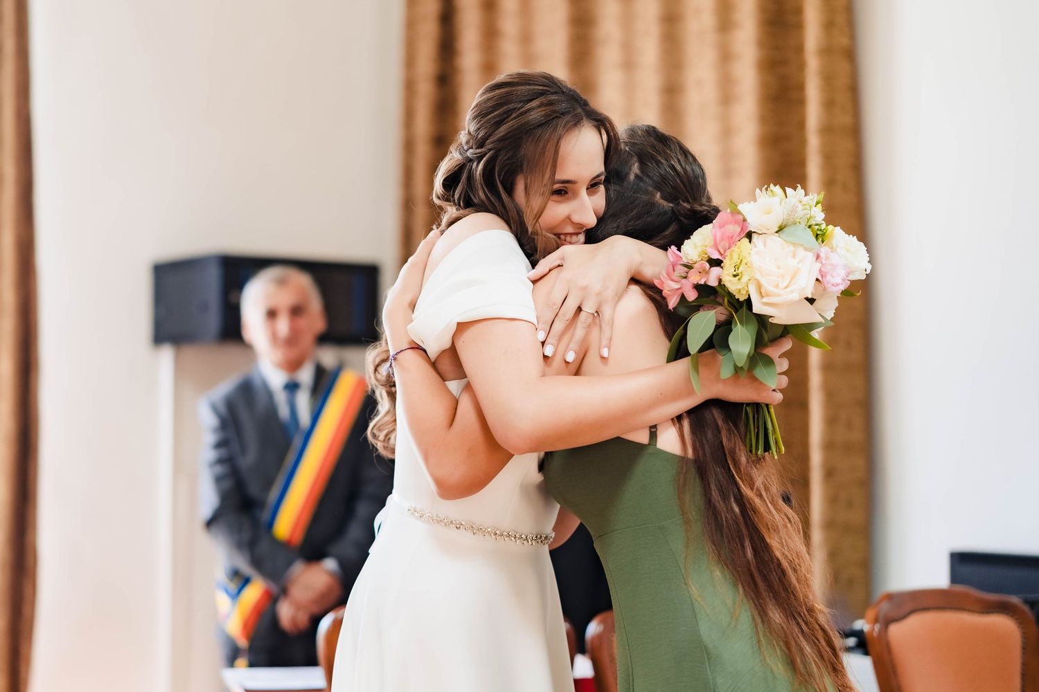 Celebratory moments captured during an indoor wedding reception with warm lighting.