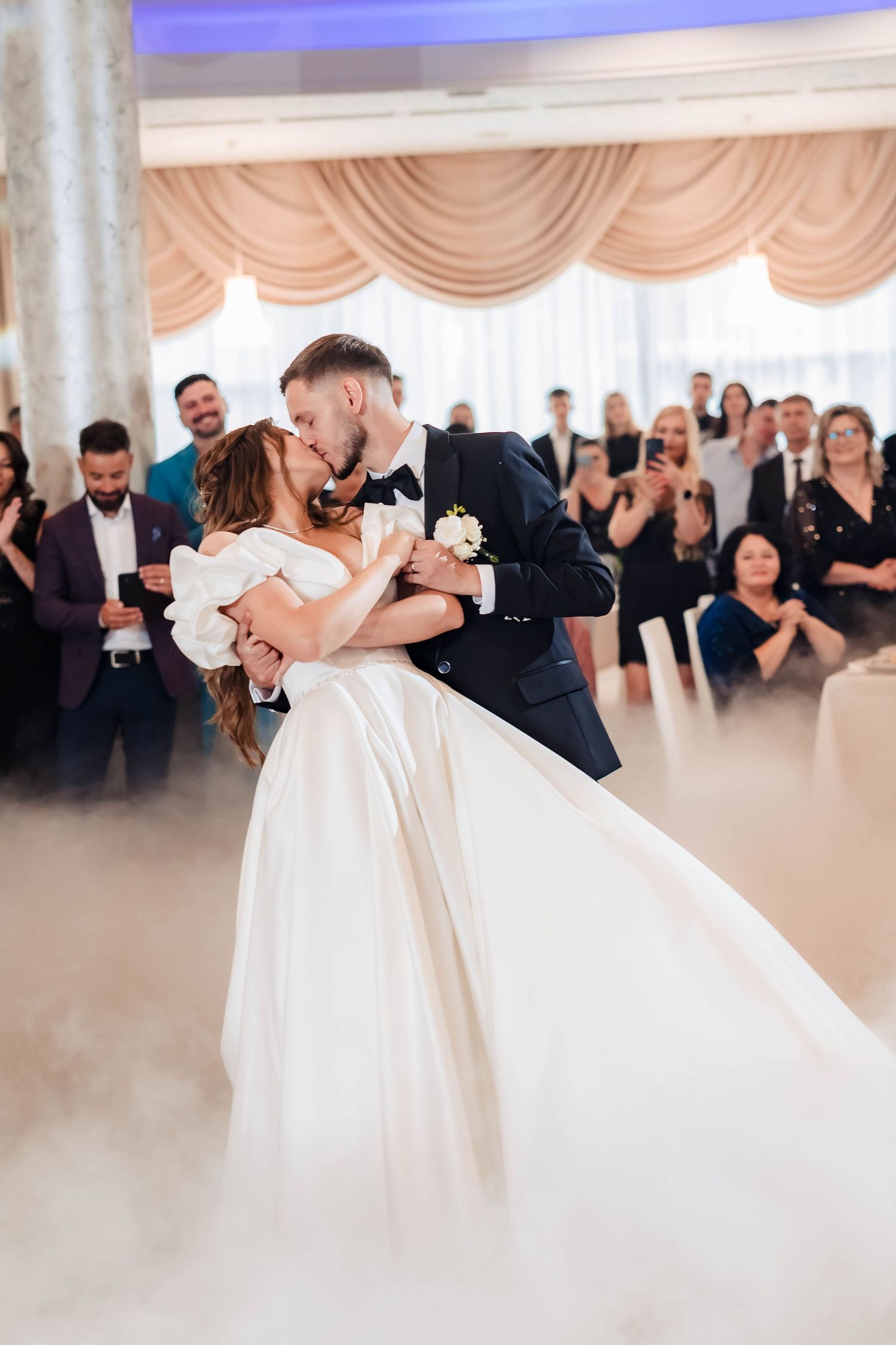 First dance sequence in elegant ballroom with fog effect and dramatic lighting.