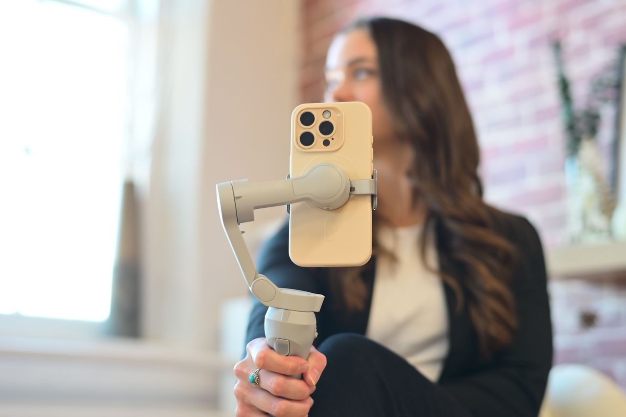 Wedding content creator in Hamilton capturing candid moments on iPhone