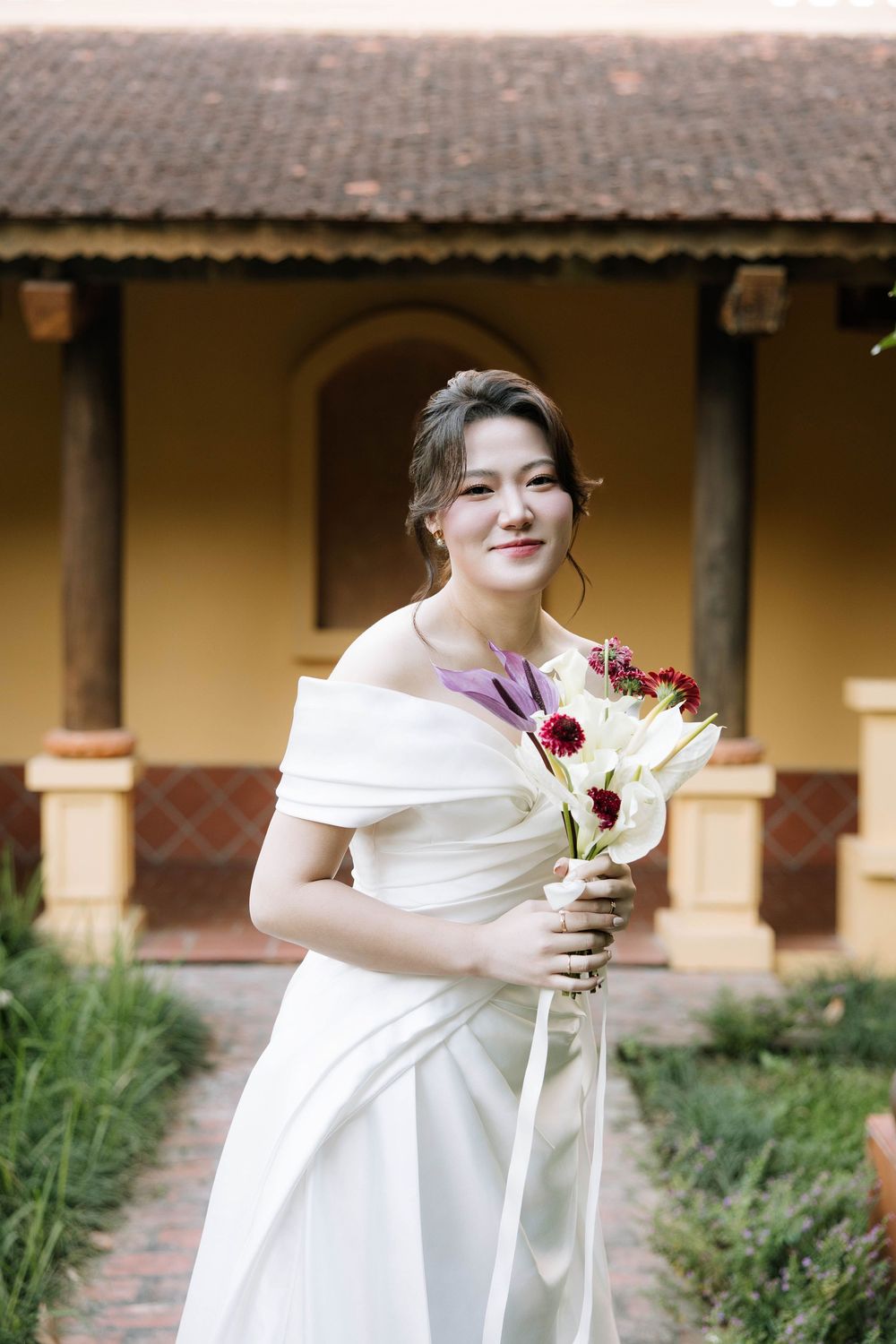 Natural prewedding moment of Chrish & Jenny laughing together in Trang An