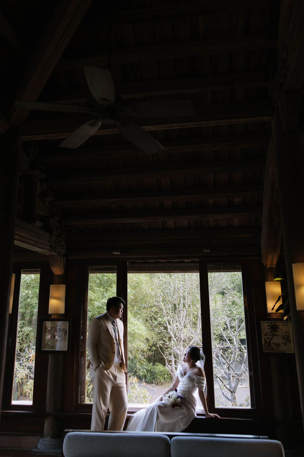 Wide-angle prewedding photo capturing river and mountains in Ninh Binh, Vietnam