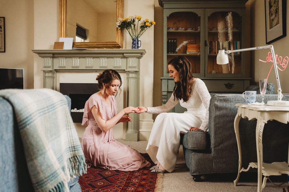 A series of candid moments showing wedding preparations in a bright interior space.