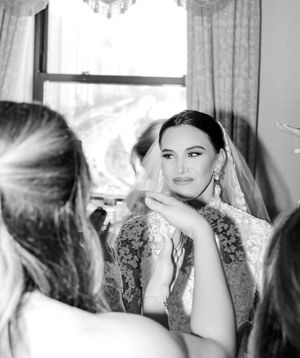 Black and white artistic bridal portraits showing romantic poses and expressions.