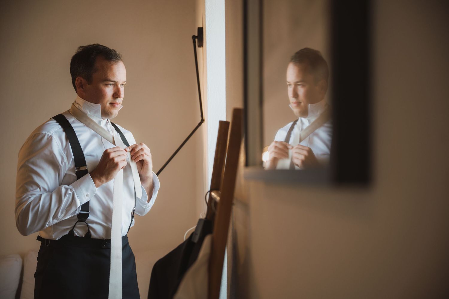 Getting ready sequence showing morning wedding preparations in warm indoor lighting.