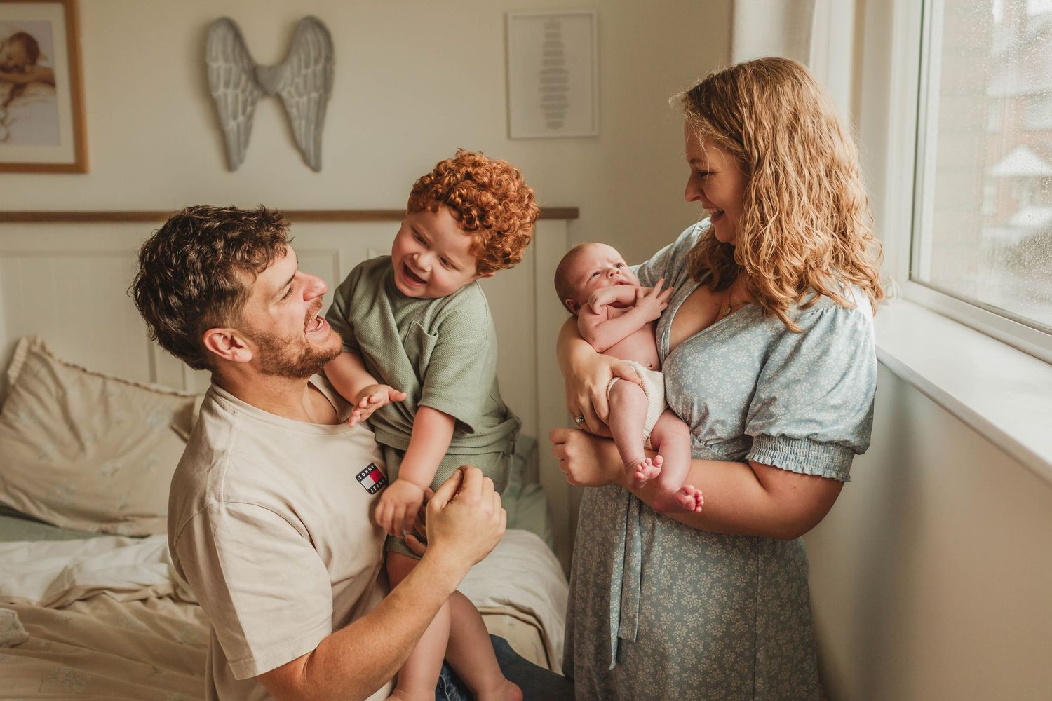 A series of tender moments between a couple in a bright, sunlit room with neutral decor and soft lighting.