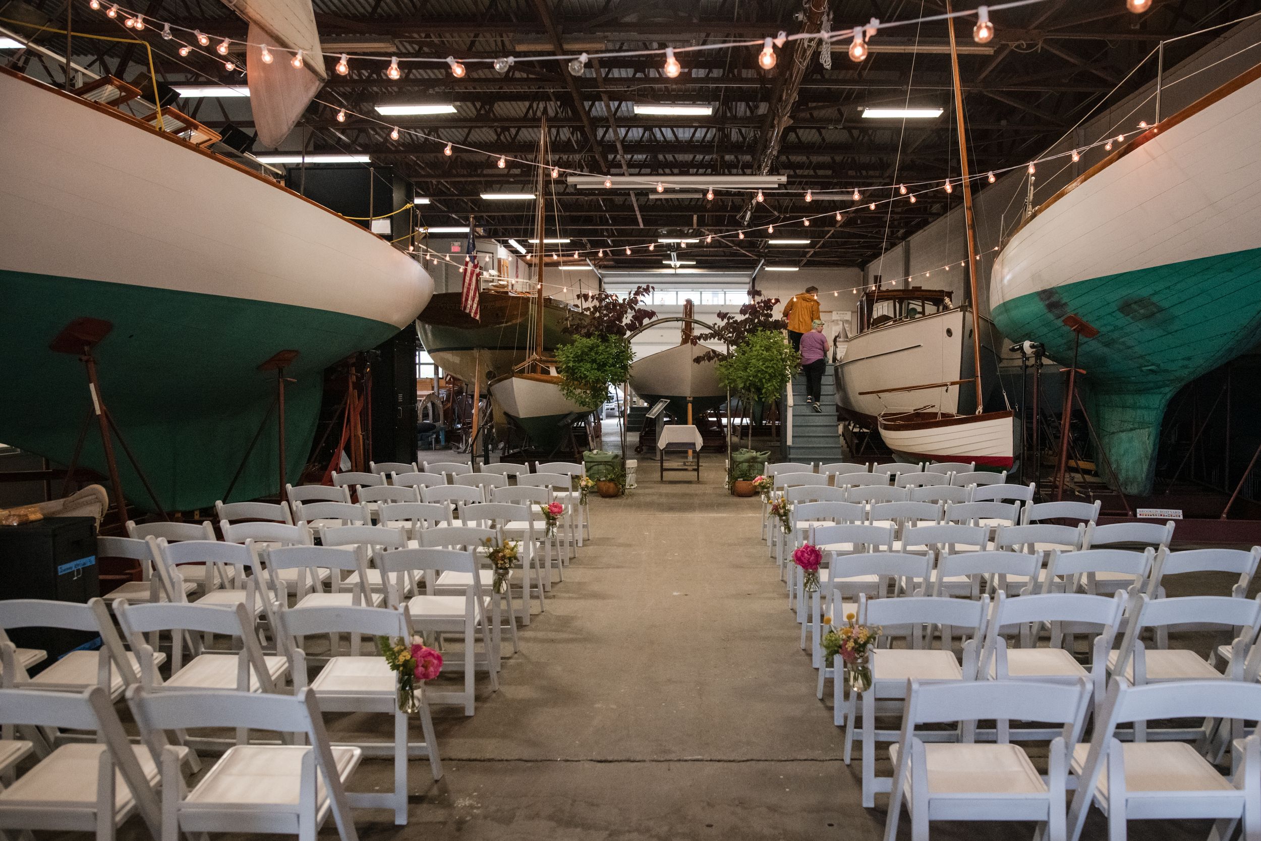 Nautical wedding at Herreshoff Marine Museum in Bristol. Historic Hall of Boats wedding photography in RI by professional Stefy Hilmer.