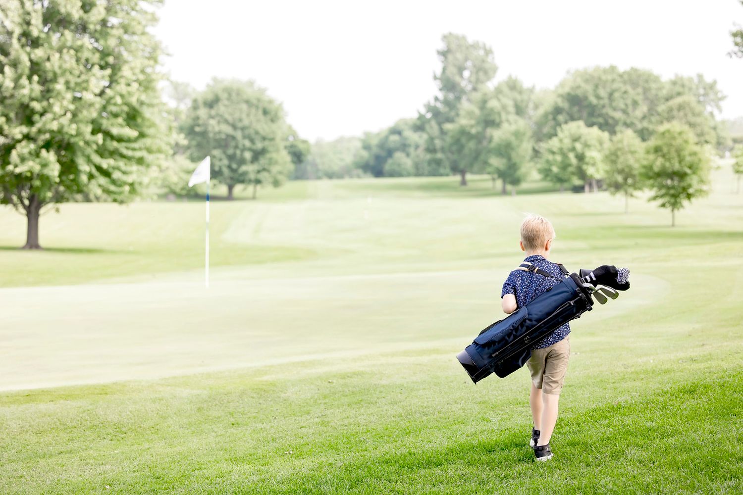 Kids golf bag photographed on the golf course for lifestyle product photos